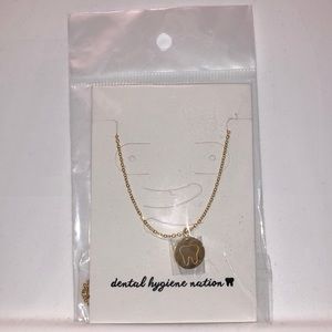 Gold, tooth print necklace, brand new!!